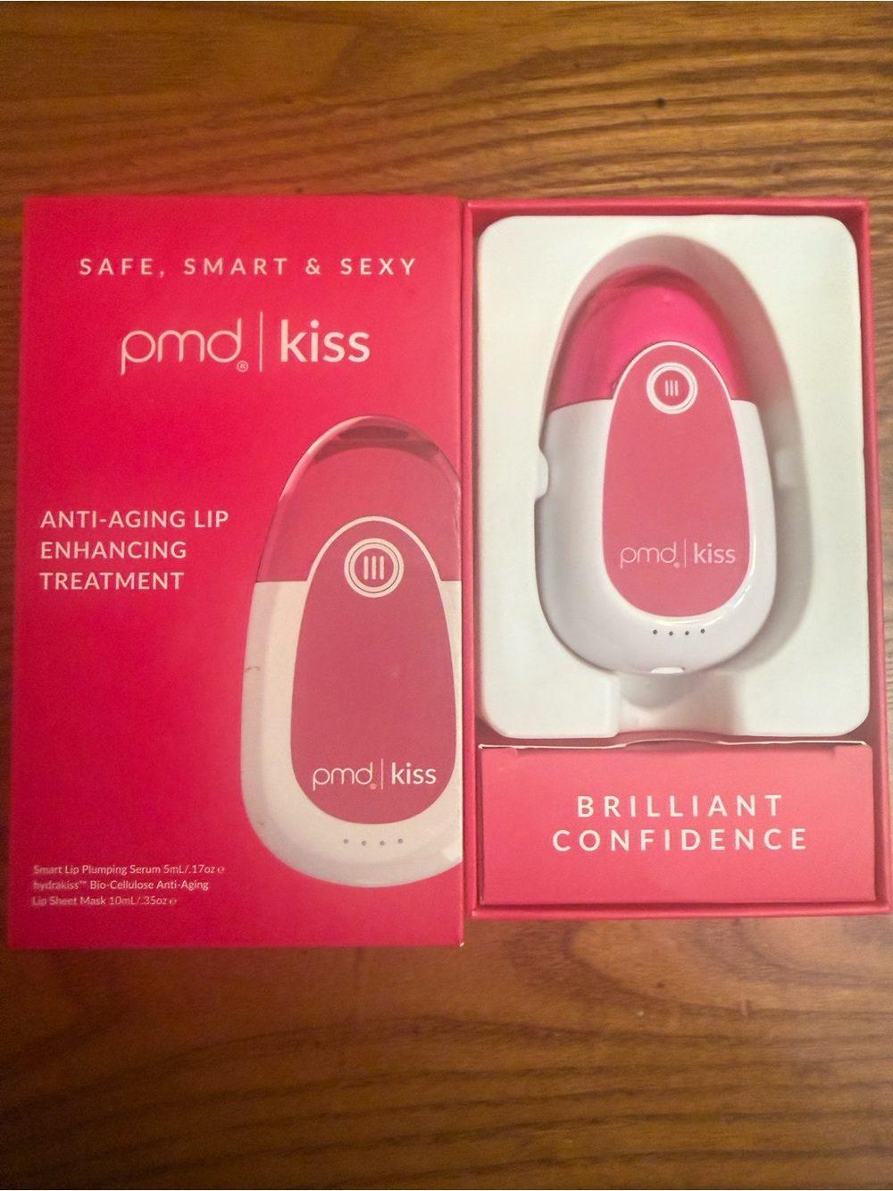 PMD kiss Lip Enhancing Device in Pink and White